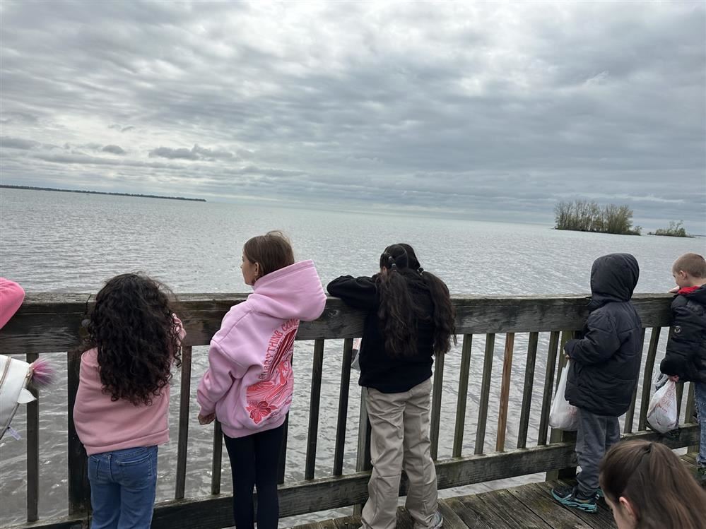  students looking out at Lake Erie